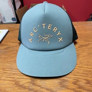 Curved brim trucker hat